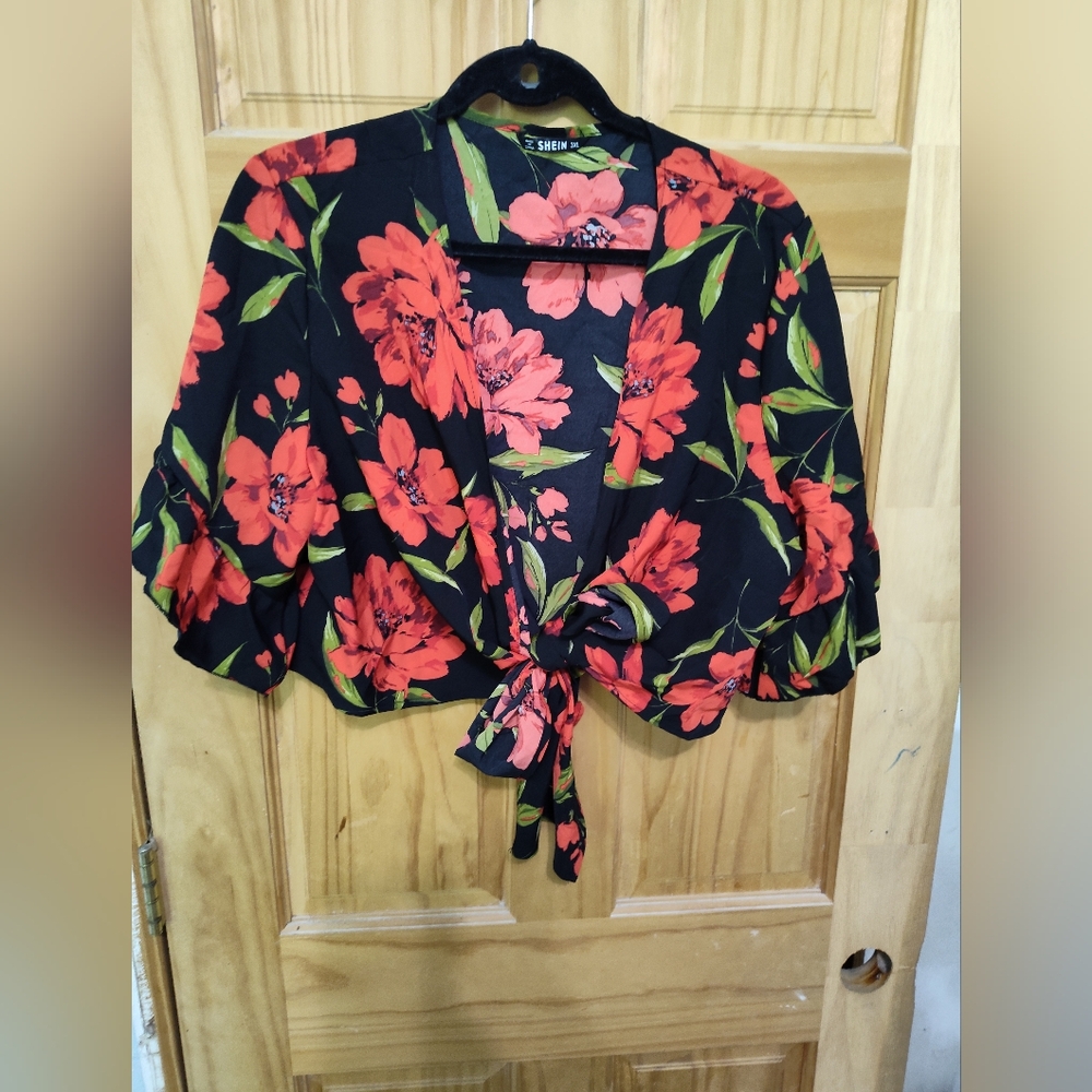 red flowers tied in the front shirt